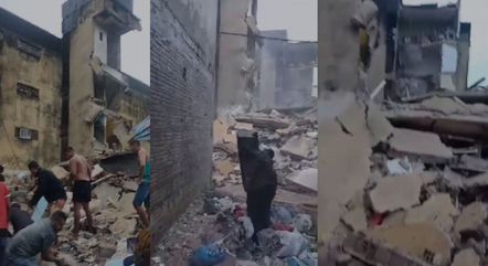 Moradores ajudam bombeiros em resgate de vítimas soterradas após desabamento de prédio
