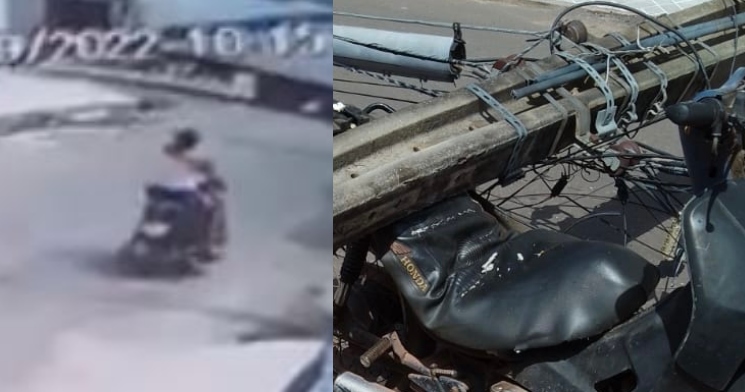 Poste cai em cima de mulher enquanto ela passeia de moto no meio da rua; veja o vídeo
